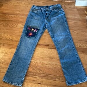 Hand embroidered thigh pocket for phone jeans